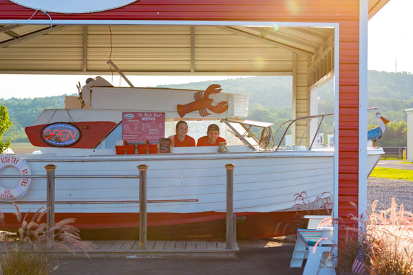 A real boat repurposed for counter service for Fish Fry orders